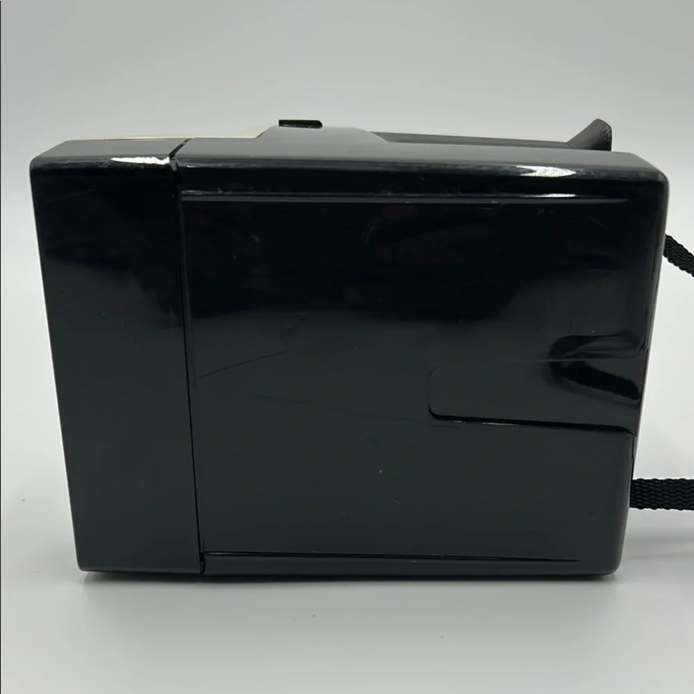 Vintage Polaroid Black and White Film Camera with Instant Photo Feature